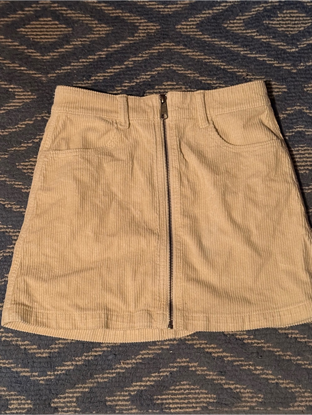 Corduroy Front-Zip Mini Skirt in Beige
